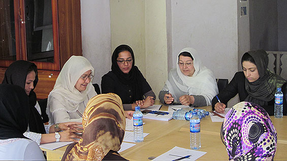 Ms. Mojadidi (in black with glasses) at the Women's Assembly Hall needs assessment meeting in Faryab province. <br /><br />