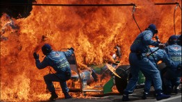 'Narrow Escape—Fire Incident in Hockenheim, German F1 Grand Prix, July 31, 1994' by Arthur Thill/ATP Photo Agency 