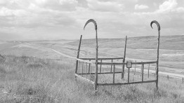 A lone grave in Kyrgyzstan. For more photos, enlarged, see at the bottom of the article. Photo courtesy Margaret Morton
