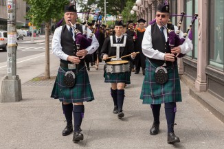 The East Village was alerted to the start of Cooper's graduation with the music of a bagpipe corps, a school tradition.