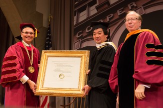 Pres. Bharucha (l) and Richard Lincer (r) present Shigeru Ban AR'84 with a Doctor of Humane Letters
