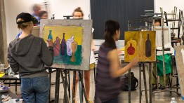 students painting