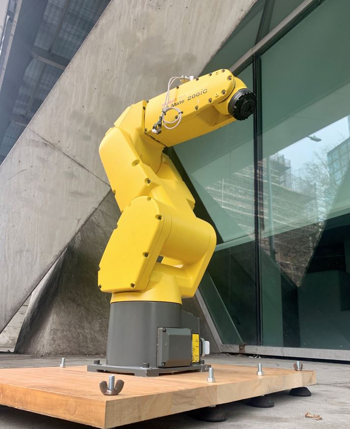 Robot arm manufactured by Fanuc.