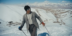 Skier in white sunglasses