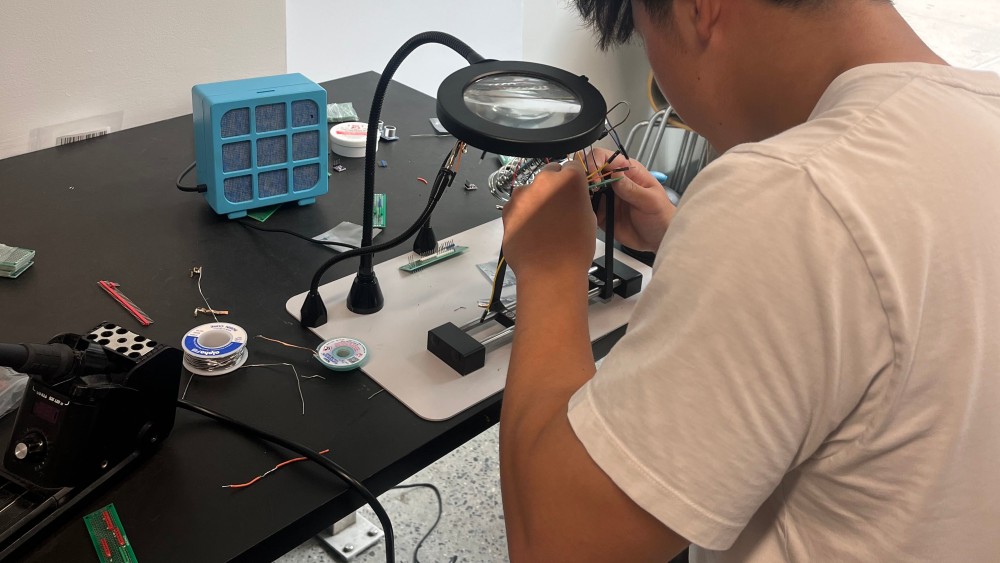 Student Using Helping Hands