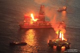 Gasses captured from the leaking Macondo well are flared by Transocean drill ship Discoverer Enterprise and rig Q4000. 