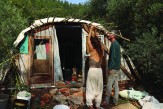 Danielle and Ofek pictured building the ecological tiny house, Amirim