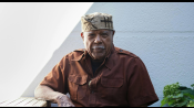Portrait of Edwards in a brown shirt
