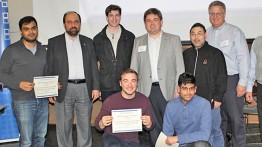 Shalin Patel (l), Chris Brancato (third from left), Ross Kaplan (seated, left) and Sahil Patel (seated, right) with IEEE judges