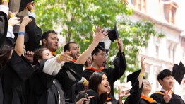 Cooper Union graduates throw hats
