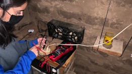 Azra Rangwala EE ’24 testing an outlet in a Guatemalan Home