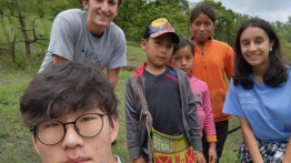 Ryan Chung ME’24 and Azra Rangwala EE’24 with children in Guatemala