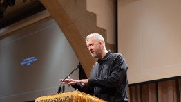 Michael Young speaks at the Lincoln lectern 