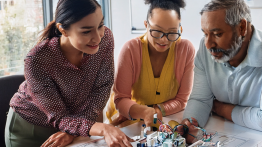 Teachers engaged in a STEM activity