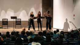 Actors Giorgia Valenti, Ana Moioli, and Janet Kilonzo in a scene from the play