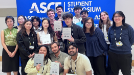 Student in group hold certificate for 2nd Place