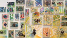 Multiple small paintings grouped together