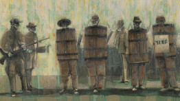 Men standing in barrels