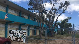 Students toured the island to understand the extent of damage from Hurricanes Maria and Irma. Here a sign declares, "Puerto Rico, we're going forward!" 
