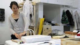 Emilie Gossiaux working in Daniel Arsham's studio in 2013