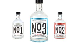 Industry City Distillery's first three batches and their bottle design. (photo courtesy of ICD)