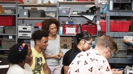 Teaching assistants Darius McKoy ME’22 and Julia Buckley ME’22 (second and third from left) in the Motorsports lab