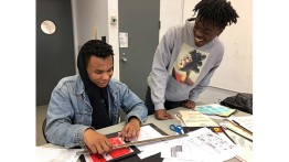 Jermaine Carter A'20 (right) is a Cooper Union art student who teaches a class in graphic design.