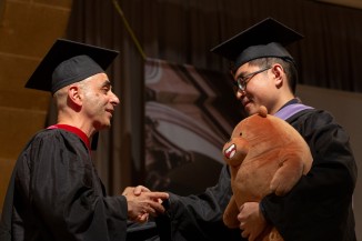 Nader Tehrani and graduate *