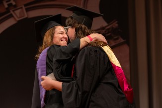 Martina Duque Gonzalez hugs Acting Dean Hayley Eber