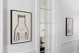 Installation image of two drawings with window in between