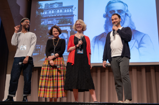 Four on stage talking