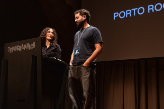 Two speakers at the lectern