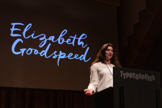 Person standing at lectern