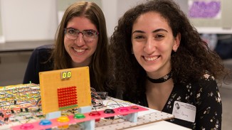 Shifra Abitan and Aziza Almanakly behind their Digital Logic Design project