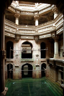Multistoried pillared galleries overlooking a central water pool in Rudabai vaav, Ahmedabad.