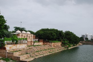 A mosque built over the long, stepped embankment of the Sarkhej tank, Ahmedabad.