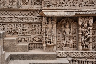 Figural stone sculptures embedded in wall panels at the Queen's Stepwell in Patan.