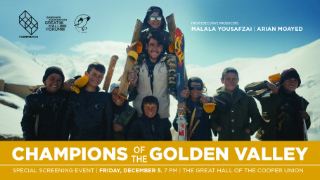 Image of skiers with mountain behind 