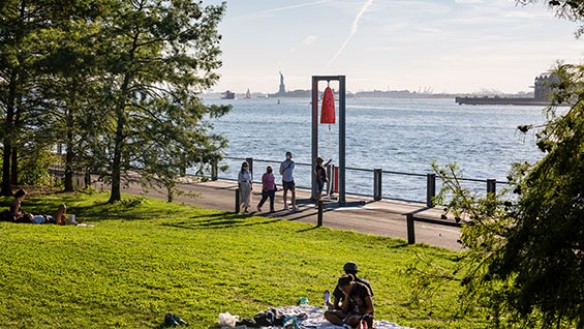 Davina Semo, Reverberation, 2020; Patinated cast bronze bell, UV protected 2-stage catalyzed urethane automotive finish, galvanized steel chain and hardware, clapper; Presented by Public Art Fund at Brooklyn Bridge Park Pier 1, August 20, 2020 – April 1