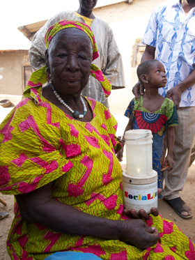 Baayiri, Ghana (2013), woman with SociaLite lantern she uses every night
