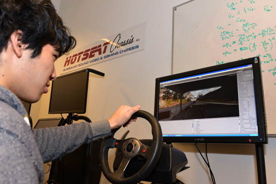 Eric Leong (ME'14) in the Hotseat Chasis simulation system